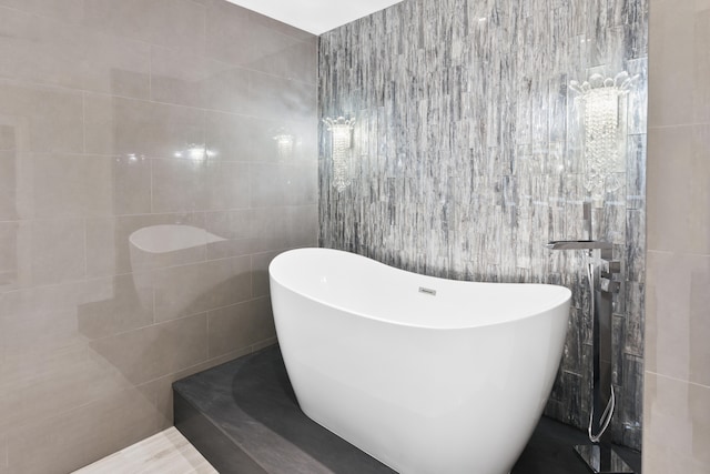 bathroom with tile walls