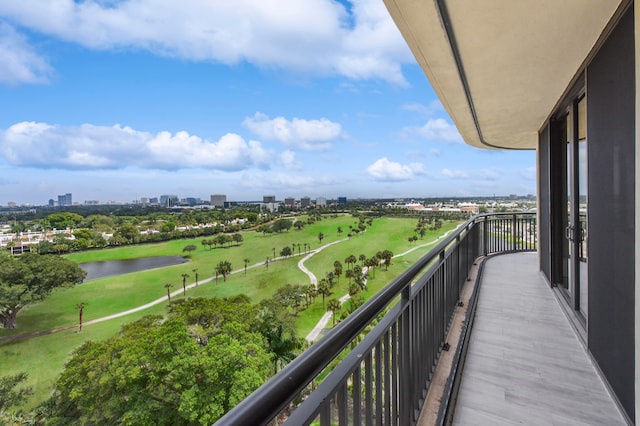 balcony featuring a water view