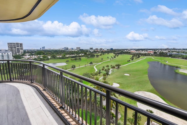 balcony featuring a water view