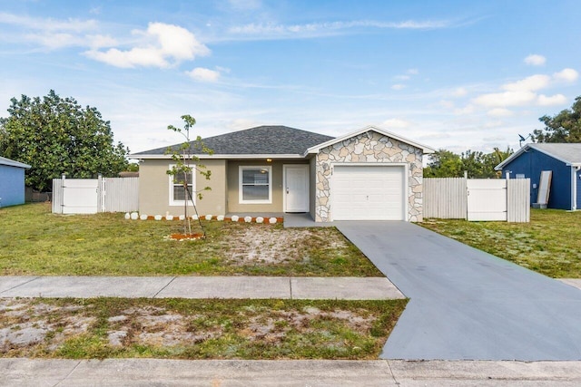 ranch-style house with a garage and a front lawn