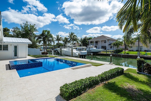 view of swimming pool featuring a water view and a dock