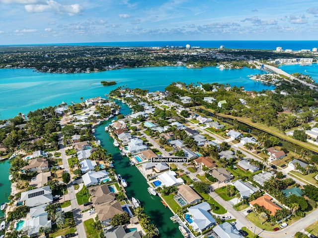 bird's eye view with a water view