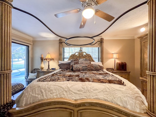 bedroom featuring ceiling fan and crown molding