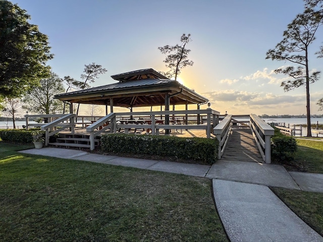 view of nearby features featuring a water view, a gazebo, and a yard