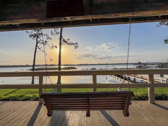 deck at dusk with a water view