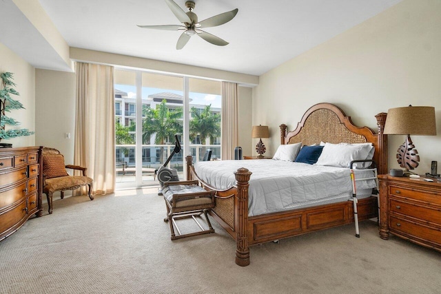 bedroom with carpet flooring, ceiling fan, and access to exterior