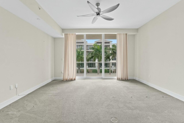 2720 Donald Ross Rd Unit 301, Palm Beach Gardens, FL 33410 - spare room with ceiling fan, baseboards, and carpet floors