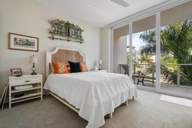 carpeted bedroom with access to outside and ceiling fan