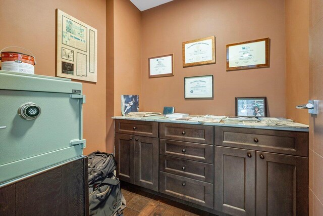 bathroom with hardwood / wood-style flooring and vanity