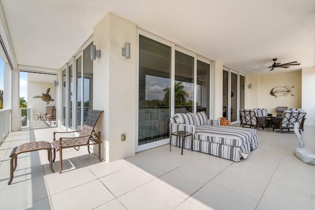 view of terrace featuring ceiling fan