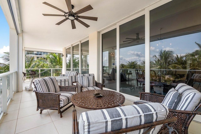 exterior space with ceiling fan and outdoor lounge area