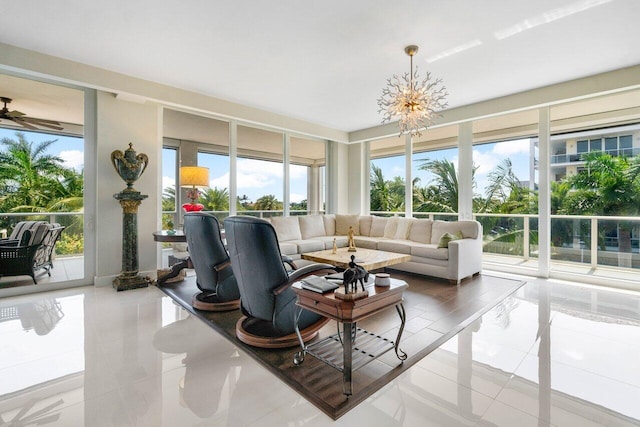 tiled living room featuring an inviting chandelier