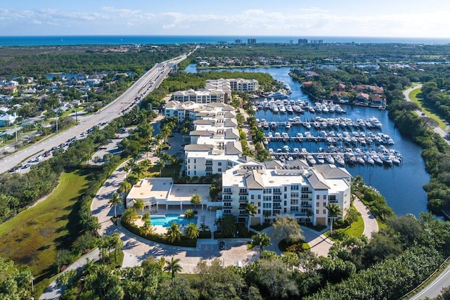 drone / aerial view featuring a water view