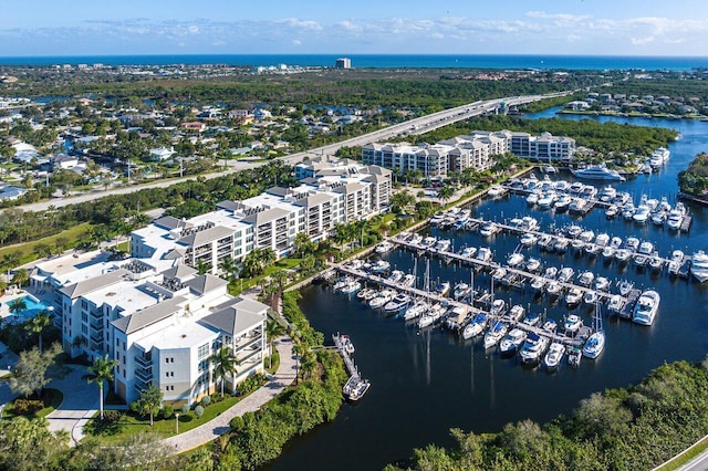 birds eye view of property featuring a water view