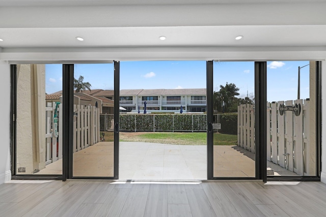 doorway to outside featuring light hardwood / wood-style floors