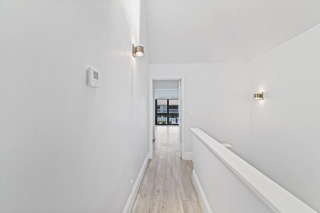 corridor featuring light hardwood / wood-style floors