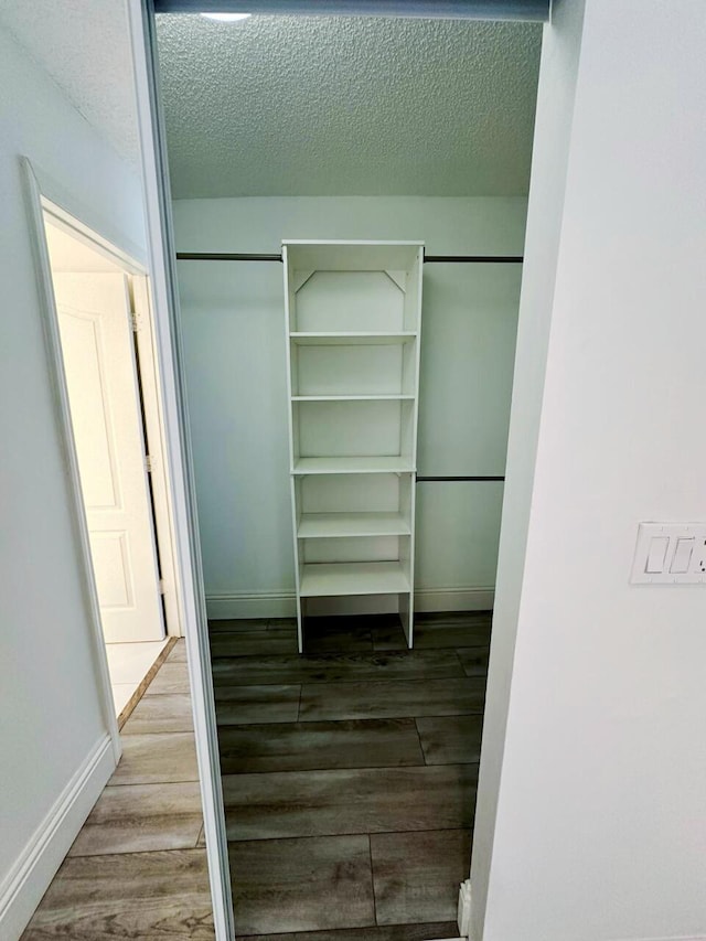 bathroom featuring tile flooring and dual vanity