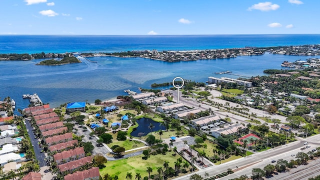 bird's eye view featuring a beach view and a water view