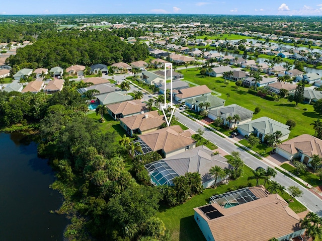 aerial view with a water view and a residential view