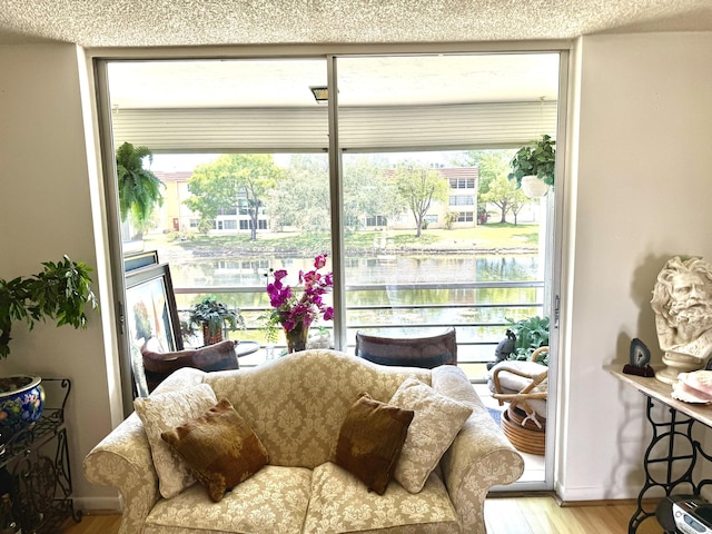 interior space featuring wood finished floors and baseboards