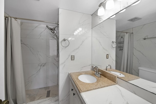 bathroom with curtained shower, tile walls, toilet, and vanity