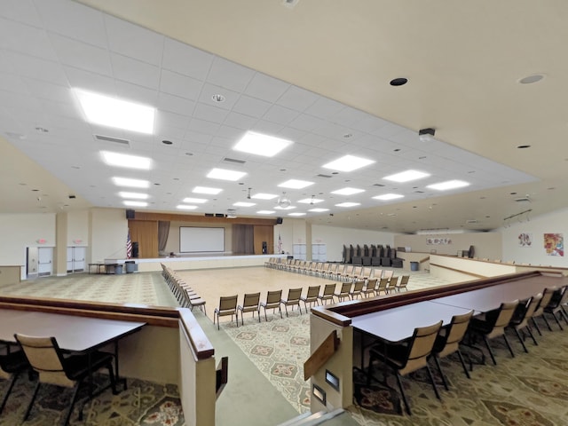 interior space with a drop ceiling and visible vents