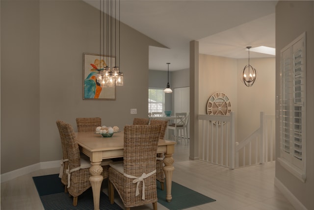 dining area featuring a notable chandelier