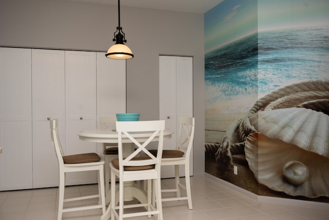 dining area with light tile floors