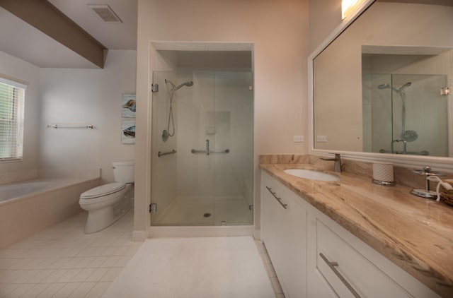 full bathroom with tile floors, toilet, oversized vanity, and independent shower and bath