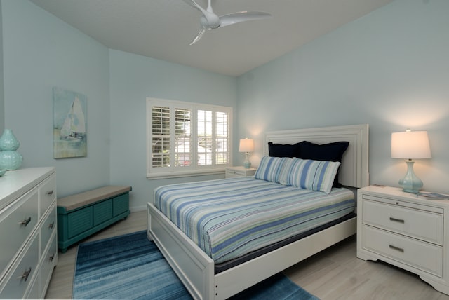 bedroom featuring ceiling fan and light wood-type flooring