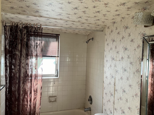 interior space with shower / bath combo with shower curtain