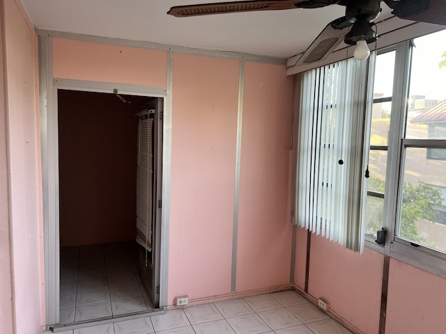 interior space featuring light tile flooring