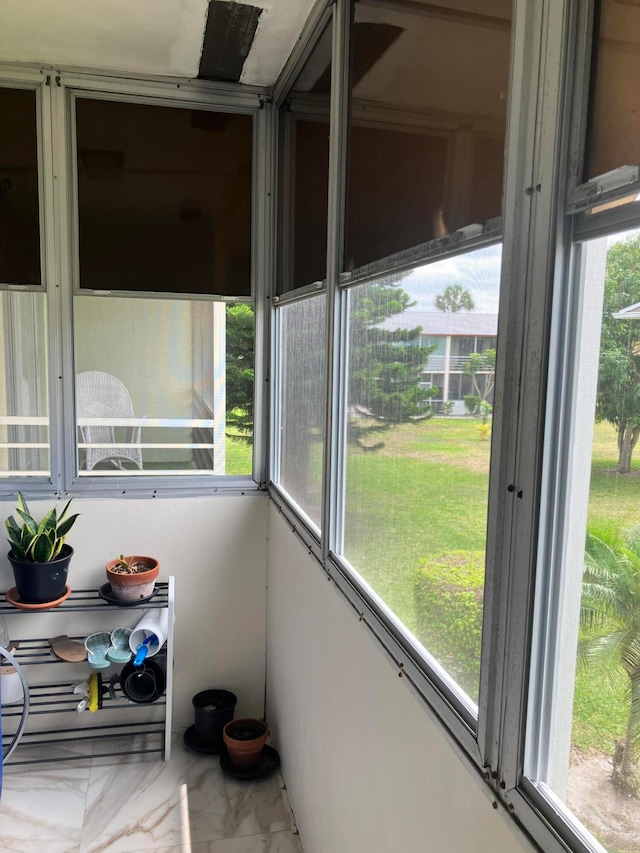 sunroom / solarium featuring a wealth of natural light