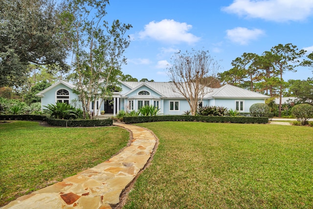 ranch-style home with a front yard