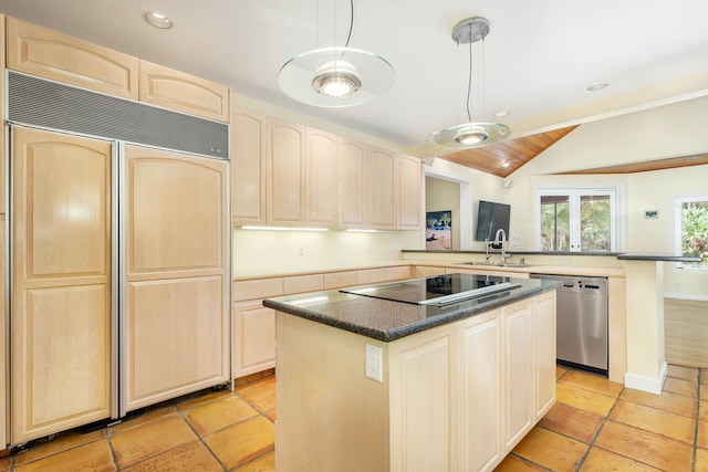 kitchen featuring stainless steel dishwasher, paneled refrigerator, hanging light fixtures, a center island, and black electric stovetop