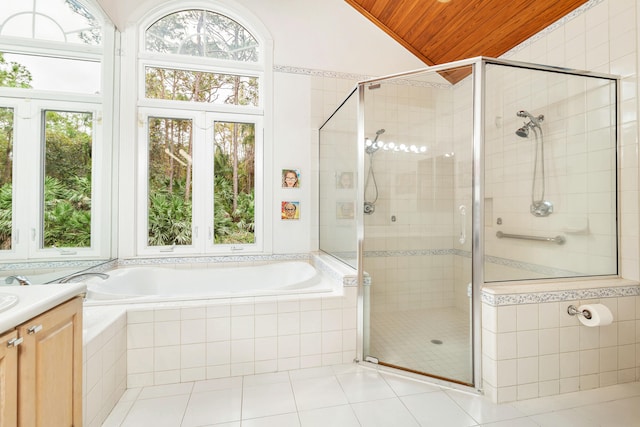 bathroom with tile flooring, wooden ceiling, vanity, and separate shower and tub