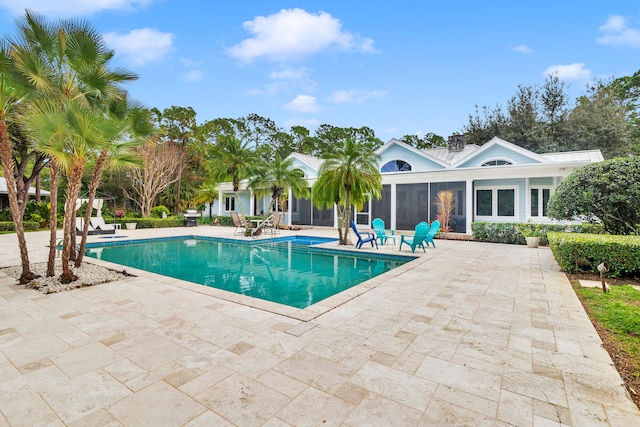 view of pool featuring a patio