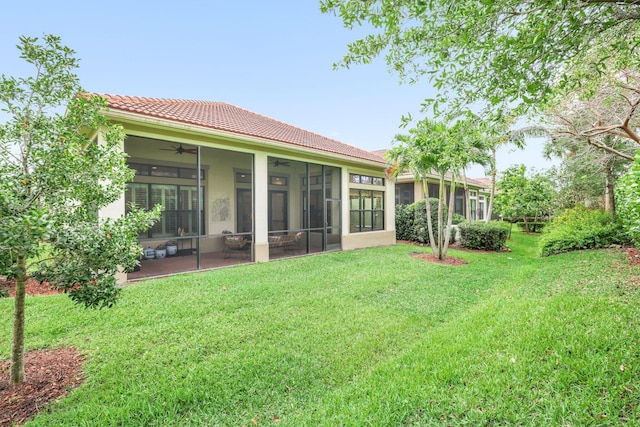 view of yard with a sunroom