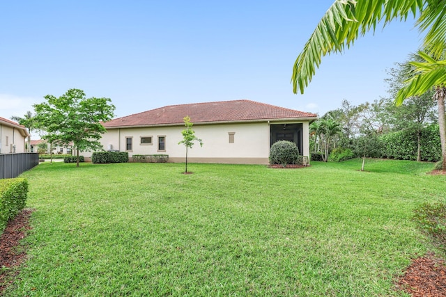 view of yard featuring a sunroom