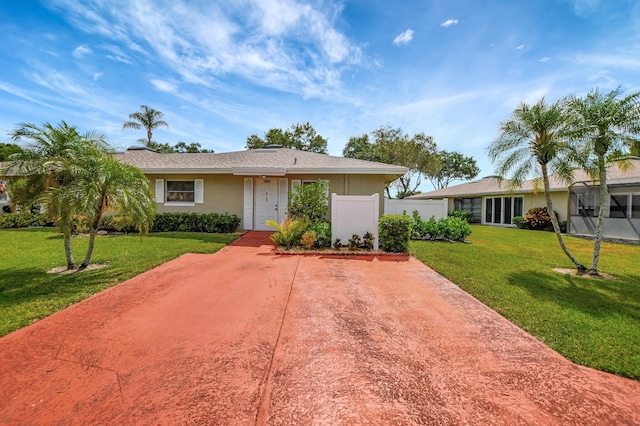 ranch-style house with a front yard