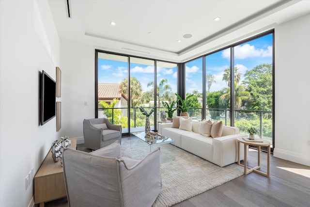 living room featuring plenty of natural light and wood-type flooring