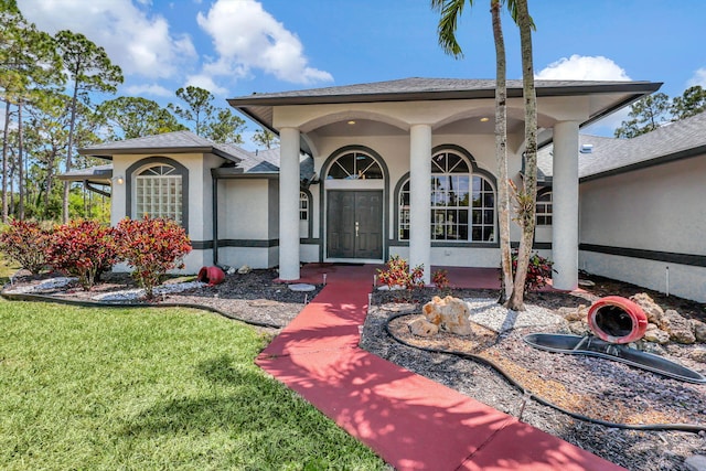 view of front of property with a front lawn