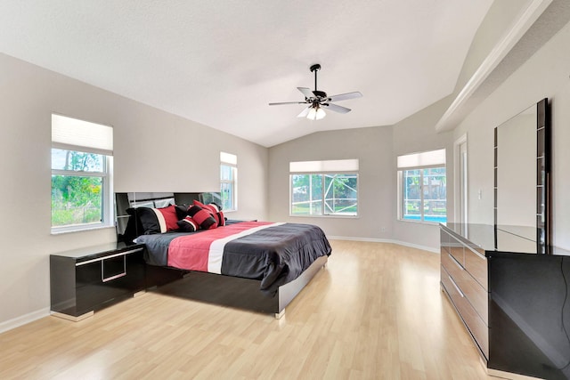 bedroom featuring lofted ceiling, ceiling fan, and light hardwood / wood-style floors