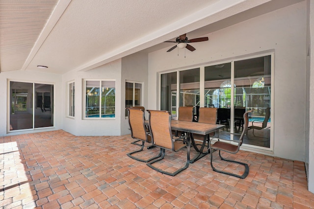 view of patio featuring ceiling fan