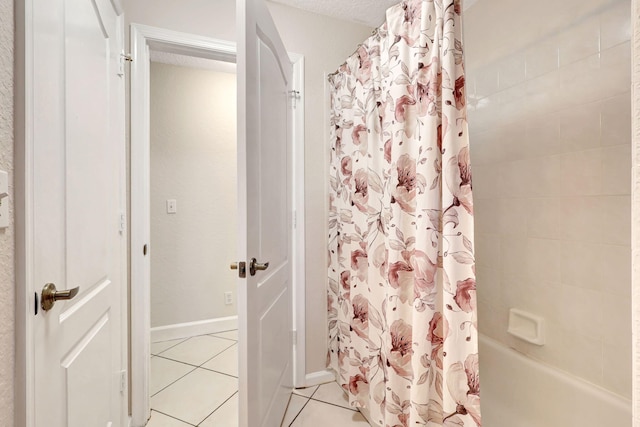 bathroom featuring shower / tub combo with curtain and tile flooring