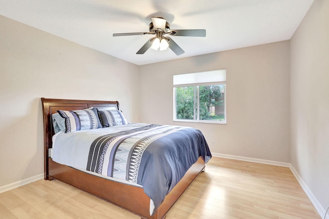 bedroom featuring ceiling fan and light wood-type flooring