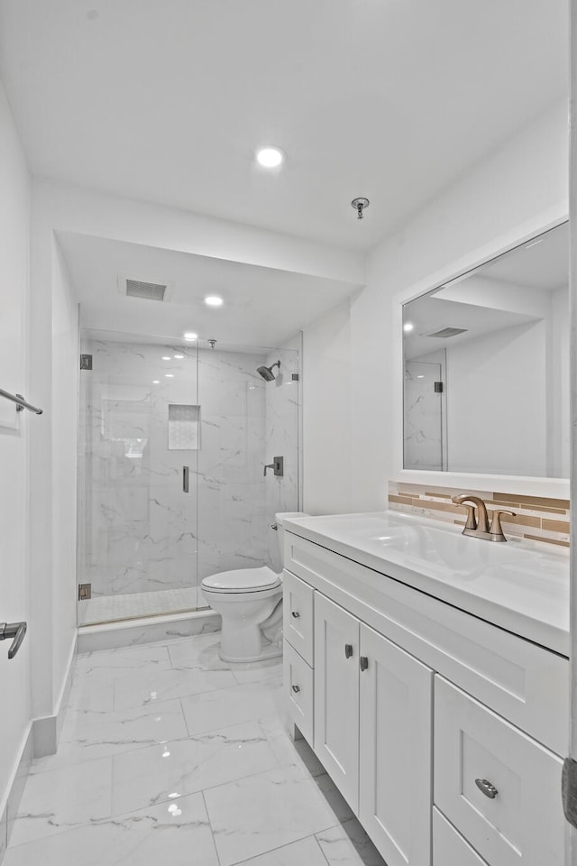 bathroom featuring walk in shower, large vanity, toilet, and tile flooring