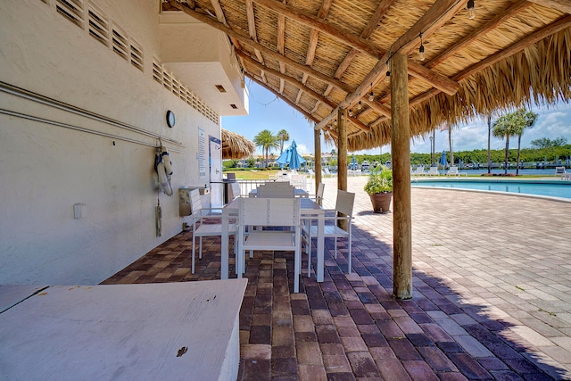 view of patio / terrace featuring a community pool