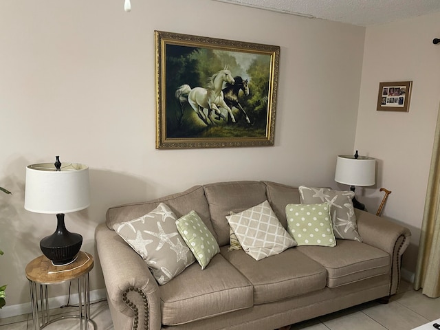 tiled living room with a textured ceiling