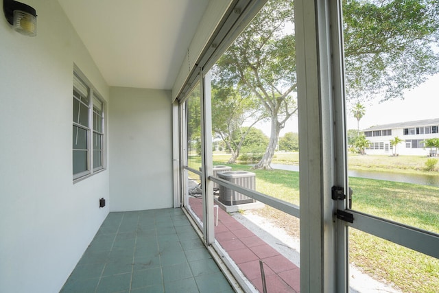 unfurnished sunroom with a healthy amount of sunlight